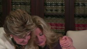 Gloria Allred comforts Summer Zervos at a news conference at Allred's L.A. office on Oct. 14, 2016. (Credit: CNN)