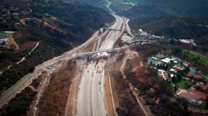 Construction crews demolish the old Mulholland Bridge over the 405 Freeway, which was closed to traffic in both directions during "Carmageddon" in 2012. (Credit: Gina Ferazzi/Los Angeles Times)