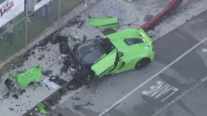 A McLaren sports car is totaled after a crash in Woodland Hills on Nov. 1, 2016. (Credit: KTLA)