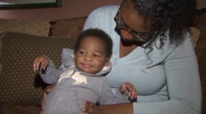 Samantha Knox holds her son, EJ, on Nov. 17, 2016. (Credit: KTLA)