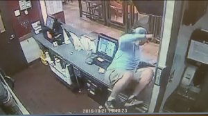 An armed robbery and fatal shooting suspect is shown on surveillance footage in a Jack in the Box in El Monte on Oct. 22, 2016. (Credit: El Monte Police Department)