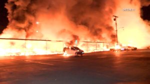 A massive fire burned at a Newport Beach storage facility early Nov. 11, 2016. (Credit: OnScene.TV)