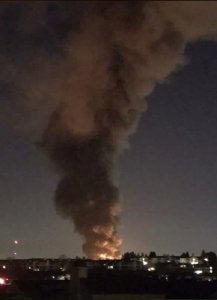 A fire is seen burning in Newport Beach on Nov. 11, 2016. (Credit: Danny Sullivan via Twitter)