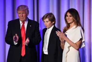 U.S. President-elect Donald Trump arrives with his son Baron and wife Melania at the New York Hilton Midtown in New York on Nov. 8, 2016. (Credit: Saul Loeb/AFP/Getty Images)