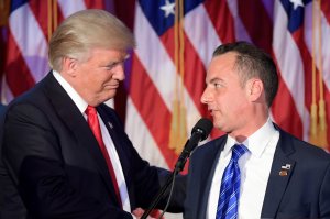 Chairman of the Republican National Committee Reince Priebus (R) shakes hands with Republican presidential elect Donald Trump (L) during election night at the New York Hilton Midtown in New York on Nov. 9, 2016. (Credit: Jim Watson/AFP/Getty Images)