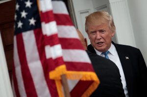 President-elect Donald Trump walks outside to greet Peter Kirsanow, attorney and member of the U.S. Commission on Civil Rights, on November 20, 2016. (Credit: Drew Angerer/Getty Images)