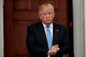 President-elect Donald Trump stands outside the clubhouse following his meeting with Ari Emanuel, co-CEO of William Morris Endeavor, at Trump International Golf Club, November 20, 2016 in Bedminster Township, New Jersey. (Credit: Drew Angerer/Getty Images)