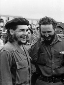 Photo taken in the 60's of then Cuban Prime Minister Fidel Castro(R) during a meeting next to Argentine guerrilla leader Ernesto Che Guevara. (Credit:AFP/Getty Images)