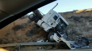 A big rig went over the side onto an embankment on the 14 Freeway in Acton on Nov. 30, 2016. (Credit: KTLA)