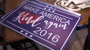 A Sacramento woman's "Make America Kind Again" signs have garnered international attention. (Credit: KTXL)