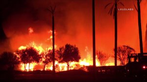 A pallet yard caught fire in Perris on Nov. 18, 2016. (Credit: OnScene.TV)