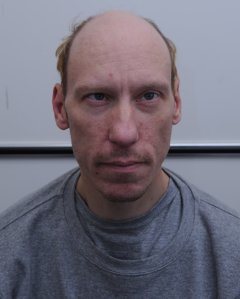 Stephen Port, 41, is shown in a booking photo. (Credit: CNN)