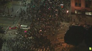 Thousands gather in downtown Los Angeles on Nov. 9, 2016 to protest the results of the presidential election. (Credit: KTLA)