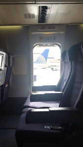 A woman opened the emergency exit door and jumped out of a plane as it was taxiing down a runway in Houston, startling passengers on board. (Credit: Hampton Friedman)