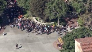 Students walk off the USC campus during a protest against President-elect Donald Trump on Nov. 10, 2016. (Credit: KTLA) 