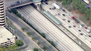 All eastbound lanes of the 210 Freeway were closed while a bomb squad investigated a suspicious package. (Credit: KTLA)