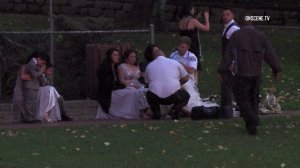 People are seen at Penn Park in Whittier after a tree fell on a wedding party on Dec. 18, 2016. (Credit: OnScene.TV)