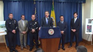 City Attorney Mike Feuer discusses legal actions against a white supremacist gang at a news conference at City Hall on Dec. 13, 2016. (Credit: KTLA)