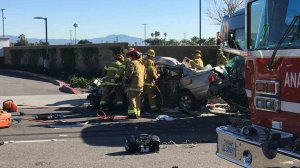 Firefighters responded to a crash between a bus and a car in Anaheim on Dec. 27, 2016. (Credit: KTLA)