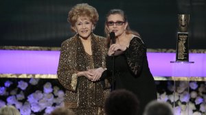 Carrie Fisher presents her mother, Debbie Reynolds, the Life Achievement Award at the 21st Screen Actors Guild Awards at the Shrine Auditorium in Los Angeles on Jan. 25, 2015. (Credit: Robert Gauthier / Los Angeles Times)