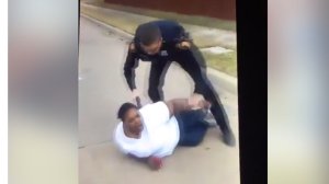 An image from a Facebook video showing a woman being arrested in Fort Worth, Texas in Dec. 2016. (Credit: Porsha Carver/Facebook)