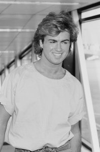 British singer-songwriter George Michael arriving at Heathrow Airport, London, 23rd August 1984. (Photo by Gerrard/Daily Express/Hulton Archive/Getty Images)