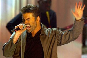 George Michael performs at the German TV show "Wetten, Dass...?" during a live transmission in Basel late March 2004. (Credit: JOERG KOCH/AFP/Getty Images)