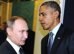 Russian President Vladimir Putin meets with U.S. President Barack Obama on the sidelines of the UN conference on climate change - COP21, on Nov. 30, 2015, at Le Bourget, outside Paris. (Credit: MIKHAIL KLIMENTYEV/AFP/Getty Images)