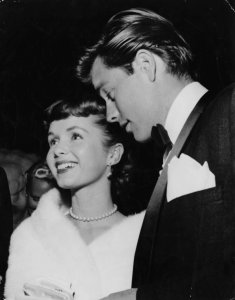 Actors Debbie Reynolds and Robert Wagner are pictured at a party in Hollywood, circa 1959. (Credit: Keystone/Hulton Archive/Getty Images)