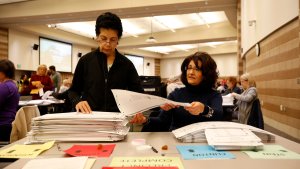 A recount of ballots cast in Oakland County, Michigan from the 2016 US presidential race takes place at the Oakland County Schools building on December 5, 2016 in Waterford, Michigan. (Credit: JEFF KOWALSKY/AFP/Getty Images)