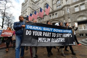 Muslims and allies march from the U.S. Department of Justice to the White House to ask President Obama to rescind NSEERSn for the #NoMuslimRegistry Campaign on Dec. 12, 2016. (Credit: Larry French/Getty Images for MoveOn.org)