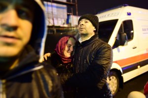 People react at the site of an armed attack Jan. 1, 2017, in Istanbul. (Credit: Yasin Akgul / AFP / Getty Images)