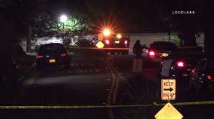 Police investigate the scene where a man was found burned in Hollywood Hills neighborhood on Dec. 17, 2016. (Credit: LOUDLABS)