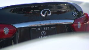 An Infiniti is shown on Dec. 27, 2016, at a Torrance dealership lot that was subject to thefts. (Credit: KTLA)