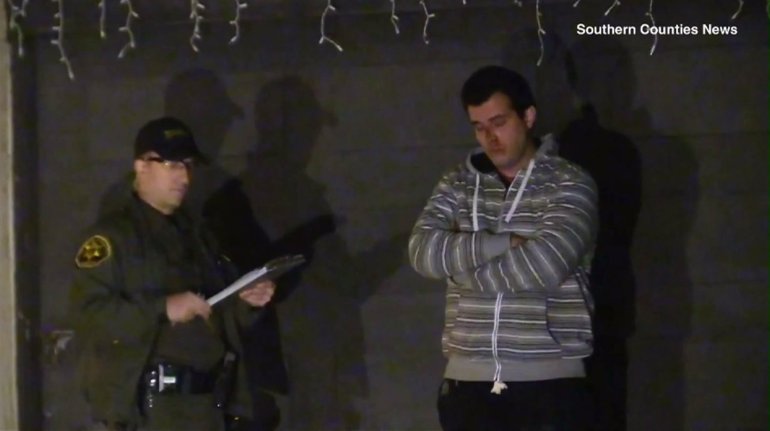 Kourosh Keshmiri is seen at the scene where he drove into a home, killing its occupant, on Dec. 29, 2013. (Credit: Southern Counties News)