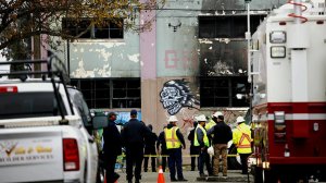 A drone flies over investigators Monday outside the Oakland warehouse where at least 36 people died on Dec. 2, 2016. (Credit: Jay L. Clendenin/Los Angeles Times)