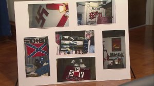 Photos connected to city legal actions against white supremacist gang are shown at a news conference on Dec. 13, 2016. (Credit: KTLA)