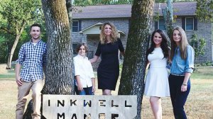 Cara Brookins and her four children stand in front of the home they built. (Credit: Cara Brookins via CNN)