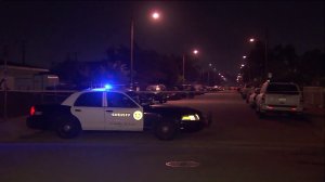 Deputies investigate a fatal shooting in Artesia on Jan. 26, 2017. (Credit: KTLA)