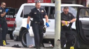 El Segundo police investigate after a man was shot dead by officers in Westchester on Jan. 18, 2017. (Credit: KTLA)