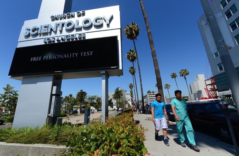 Pedestrians walk past the Church of Scientology along Sunset Boulevard in Hollywood on July 9, 2012. (Credit: FREDERIC J. BROWN/AFP/GettyImages)