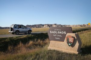 Visitors drive into the Badlands National Park on Oct. 1, 2013, near Wall, South Dakota. Although small sections of the Badlands were accessible, the park and all other national parks were closed that day after Congress failed to pass a temporary funding bill. (Credit: Scott Olson/Getty Images)