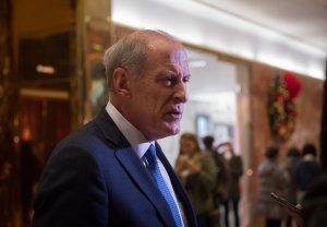 Dan Coats speaks to the media in the lobby of Trump Tower, November 30, 2016 in New York, after meetings with US President-elect Donald Trump. (Credit: BRYAN R. SMITH/AFP/Getty Images)