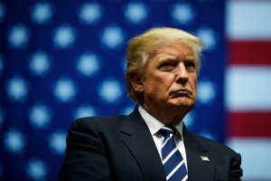 President-elect Donald Trump looks on during a rally at the DeltaPlex Arena, Dec. 9, 2016, in Grand Rapids, Michigan. (Credit: Drew Angerer/Getty Images)