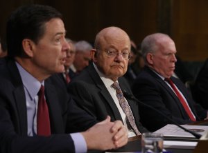 FBI Director James Comey, Director of National Intelligence James Clapper and CIA Director John Brennan, left to right, testify before the Senate (Select) Intelligence Committee in the Dirksen Senate Office Building on Capitol Hill Jan. 10, 2017. (Credit: Joe Raedle/Getty Images)