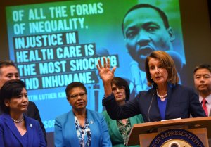 Rep. Nancy Pelosi speaks beside House Democrats at an event to protect the Affordable Care Act in Los Angeles on Jan. 16, 2017. (Credit: MARK RALSTON/AFP/Getty Images)