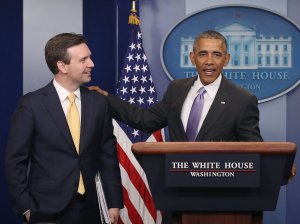 President Barack Obama surprises White House Press Secretary Josh Earnest during his last briefing for the administration at the White House, on January 17, 2017 in Washington, DC. (Photo by Mark Wilson/Getty Images)