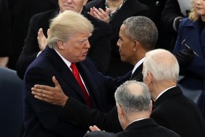 Former U.S. President Barack Obama (R) congratulates U.S. President Donald Trump after he took the oath of office on the West Front of the U.S. Capitol on Jan. 20, 2017 in Washington, DC. (Credit: Drew Angerer/Getty Images)