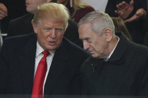 U.S. President Donald Trump and Defense Secretary Gen. James Mattis watch the Inaugural Parade from the main reviewing stand in front of the White House on Jan. 20, 2017. (Credit: Patrick Smith/Getty Images)