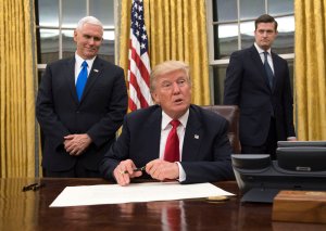 President Donald Trump speaks to the media before signing a confirmation for Defense Secretary James Mattis in the Oval Office at the White House in Washington, D.C. on Jan. 20, 2017. (Credit: Kevin Dietsch - Pool/Getty Images)